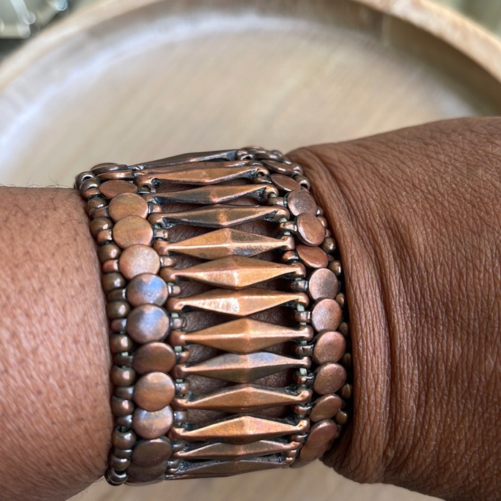 Copper tone stretchy bracelet used
